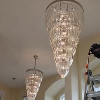 Professional chandelier cleaning service for crystal and decorative light fixtures