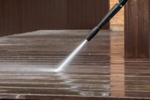 Professional pressure washing service for residential deck and exterior walls in Loveland Colorado