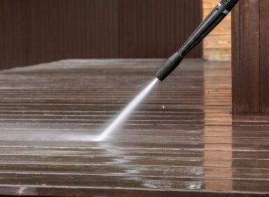 Professional pressure washing service for residential deck and exterior walls in Loveland Colorado
